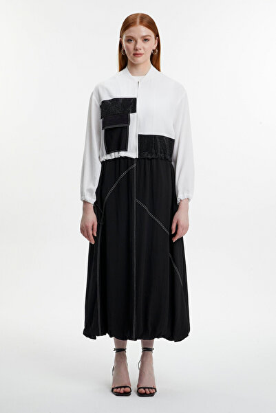 Zühre Подробно описание Двукомпонентен комплект от яке и пола с балонни ръкав...