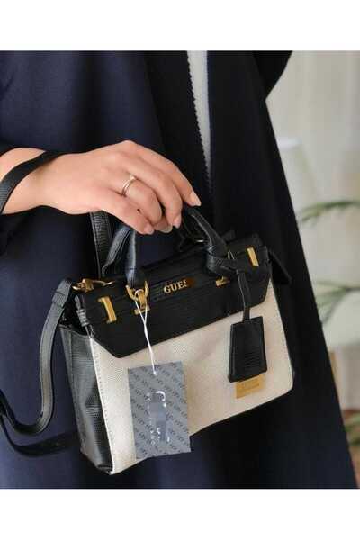 GUEE حقيبة كتف نسخه طبق الاصل من الماركه الشهيره تاتي معا علبه وكيس وكرت ضمان...