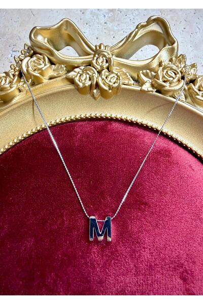 ANKA JEWELLRY قلادة على شكل حرف M باللون الفضي