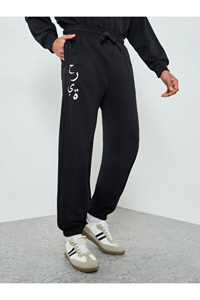 Styli Men Black Graphic Print Joggers