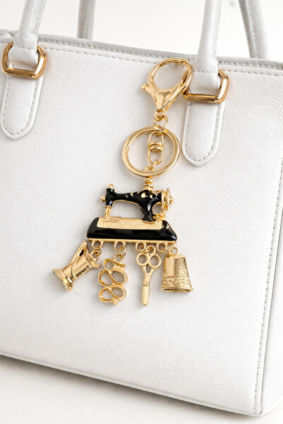 Modex Golden yellow charm figured sewing machine keychain