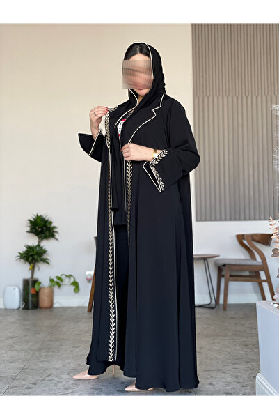 Leatherthreads The black Sunbulah abaya features vertical wheat stalk embroid...