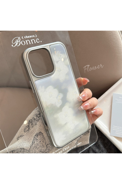 Choice19 غلاف هاتف iPhone 15 Pro A ins أبيض مزين بزهور ضبابية وحواف فضية مع غ...