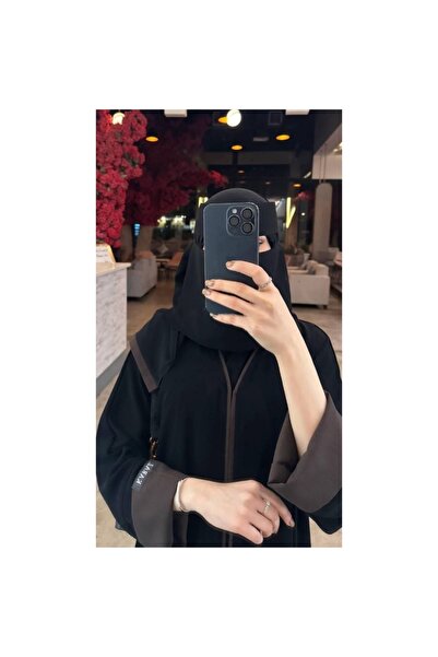 Lamsa Reem Abaya – Black elegance with a warm brown touch