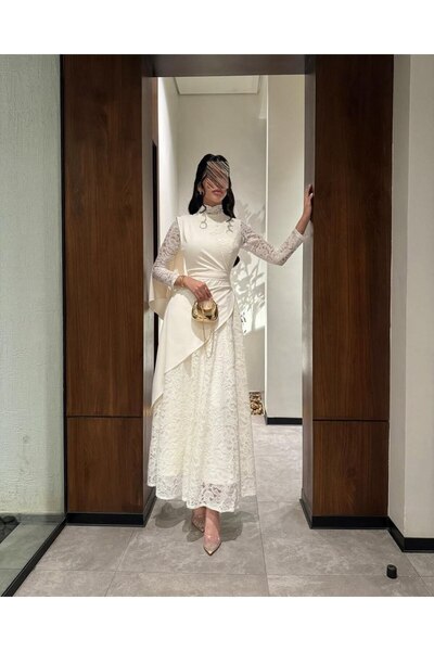 Viola2026 An elegant white dress with a long design that combines the softnes...