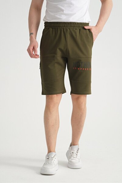 Shooter Sportswear شورت رجالي كاكي فاخر بتفاصيل طباعة خفيفة وتفاصيل جيوب بسحا...