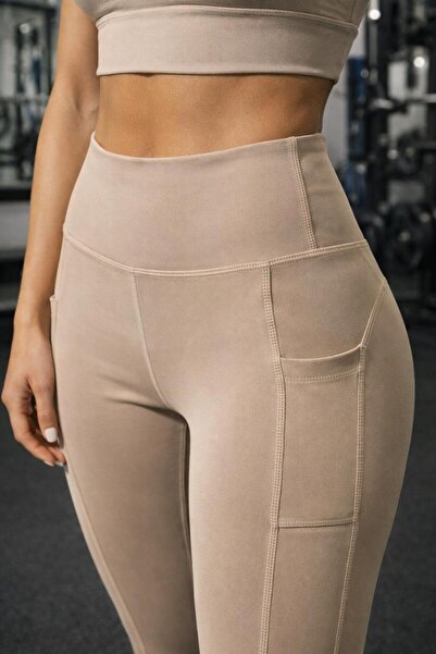 İNCEBELLİ بنطلون ضيق عالي الخصر بتفاصيل جيوب من قماش المودال