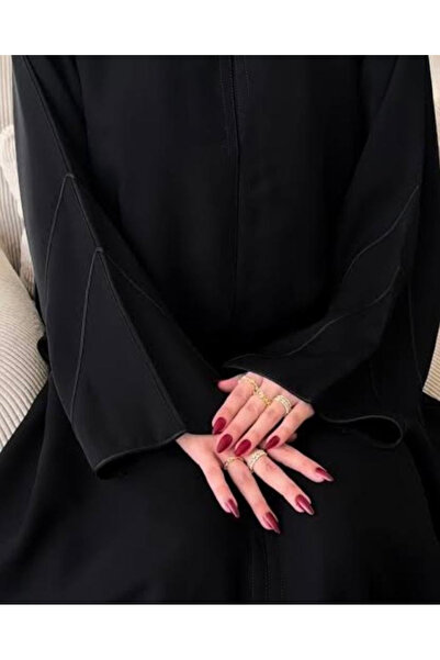 Abay-ti Black abaya with a stylish front snap closure and distinctive sleeve ...