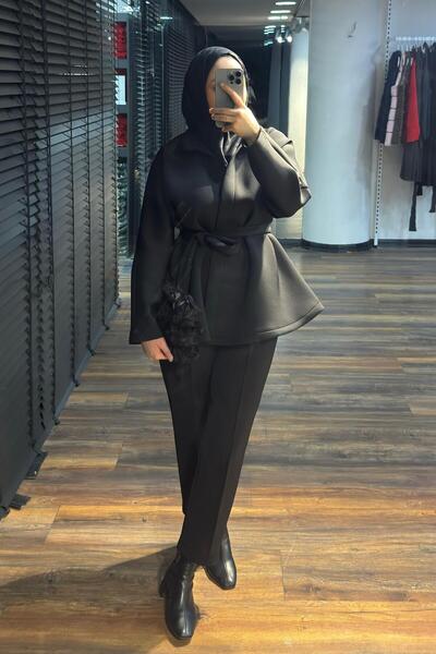 Tuba Sözen Belted Puffy Suit