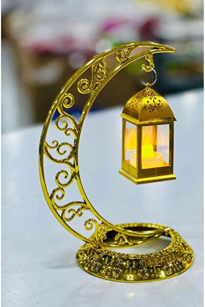 mm A Ramadan lantern in the shape of a crescent moon with a hanging lantern i...