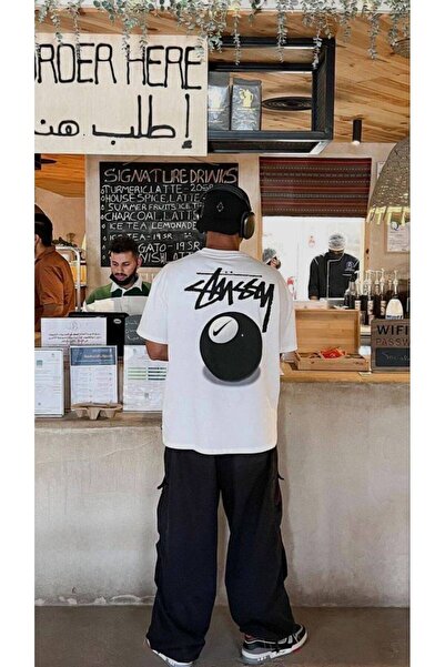 CLASSY.MODA تي شيرت أبيض كبير الحجم للجنسين مطبوع بقصة مريحة ملابس كاجوال أني...