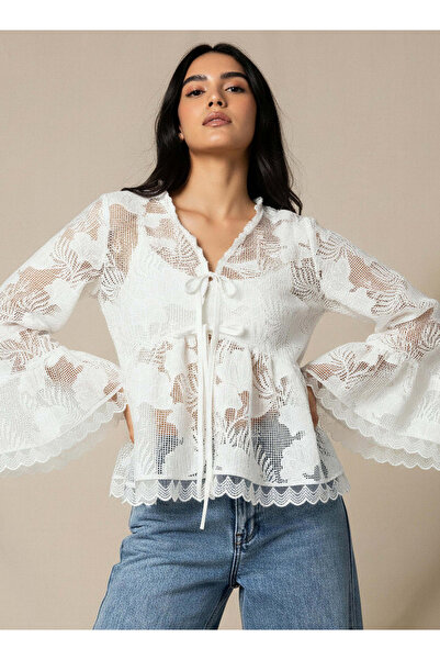 Iconic بلوزة فضفاضة بقصة قصة مريحة وحافة مزخرفة