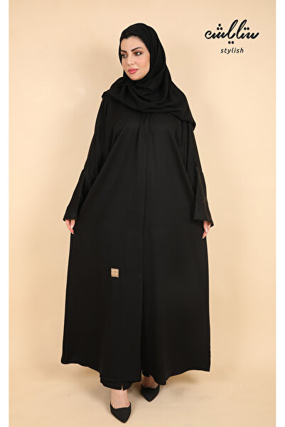 Stylish Stylish abaya in black, decorated with floral crystals on the sleeves