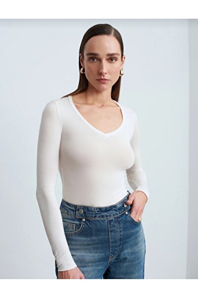 IŞILDA FASHION Διαφανής μπλούζα από κασμίρ με λαιμόκοψη V