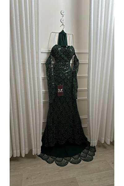 Ora An olive-green dress with a hem