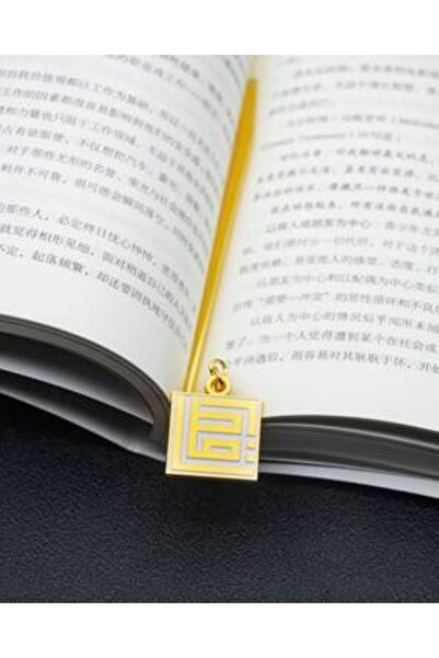 Generica A distinctive and beautiful gold-colored metal bookmark for the Holy...