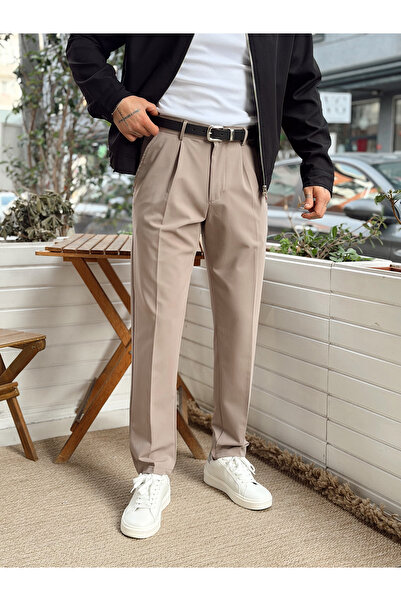 manch collection Carrot Cut Pleated Trousers Ash