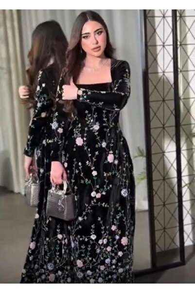 NO BRAND The dress is made of Korean velvet with embellishments on the fabric.