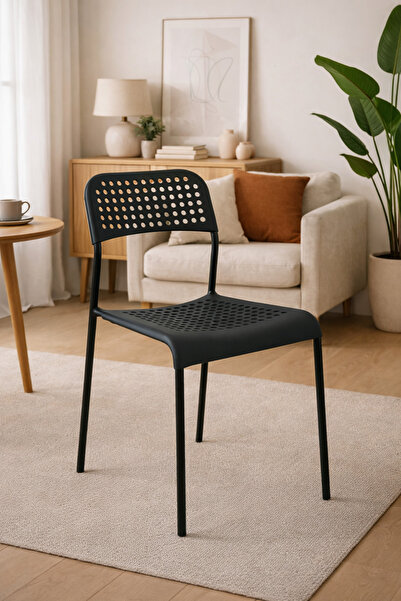 N.zone A modern chair with a stylish perforated design and a sturdy, Lightwei...