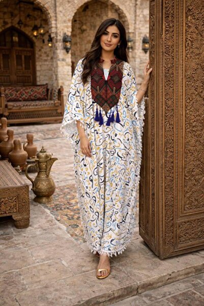 Lyaly aljlabyh 🦋 "Nasma Ramadan" Jalabiya - A flowing butterfly design, perf...