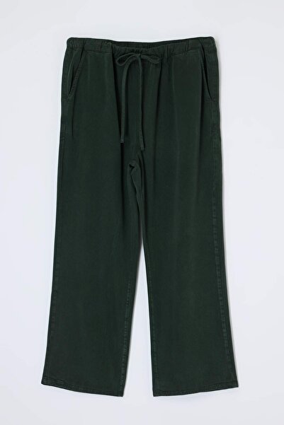 Trendyol Curve Khakifarbene Jeans mit hoher Taille und weitem Tencel-Schlagho...