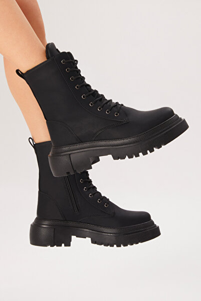 Tonny Black حذاء نسائي ذو جلد أسود مريح ونعل سميك وأربطة وسحاب