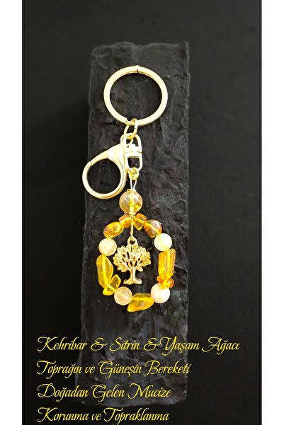 arzela سلسلة مفاتيح من الحجر الطبيعي باللون العنبر والسيترين تحمل رمزًا للحما...