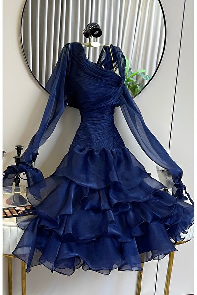 Viola2026 An elegant evening dress in a deep royal blue color, made from soft...
