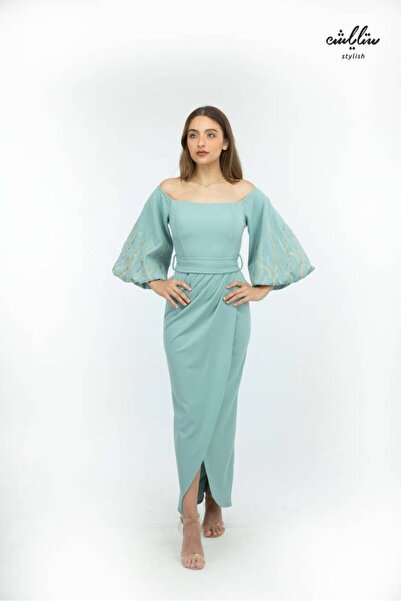 Stylish (Stretch) A stylish off-shoulder dress in a soft sky blue color with ...
