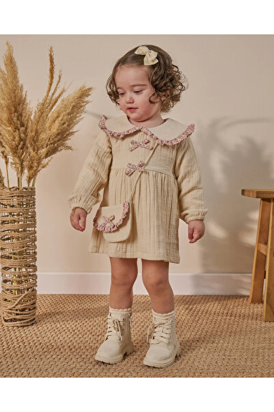 Bupper Fiyonk Detaylı Çantalı Müslin Elbise