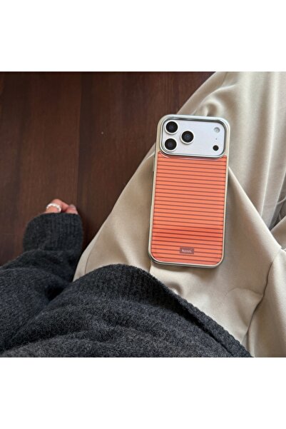 choice2 آيفون 17 برو، لون برتقالي، تصميم بسيط وأنيق، بخطوط ملونة، وإطار فضي م...