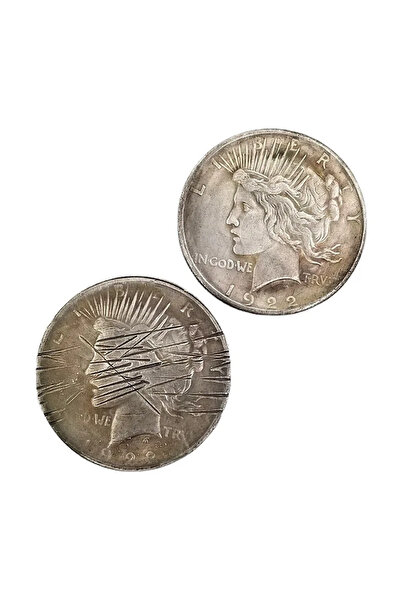 Choice عملة فضية قديمة من عام 1922 تحمل صورة تمثال الحرية الأمريكي، عليها آثا...