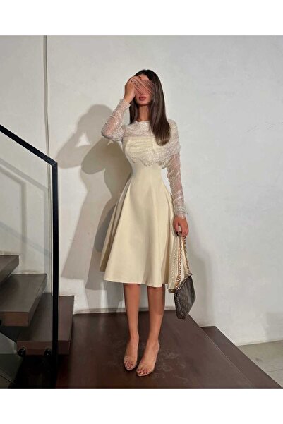 REVE Beige midi dress, with long Lace sleeves, and a defined and elegant wais...