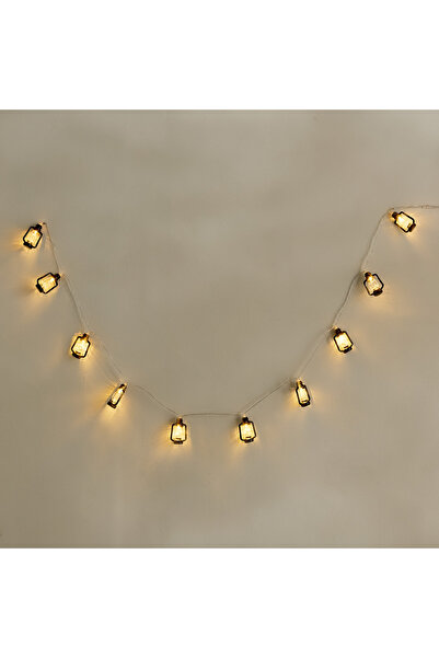 Generic سلسلة إضاءة إليو 10 مصابيح LED بيضاء دافئة تعمل ببطارية 2AA - 1.35 متر