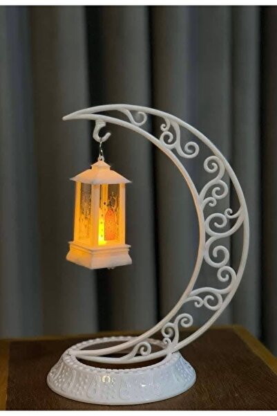 mm A Ramadan lantern in the shape of a crescent moon with a hanging lantern i...