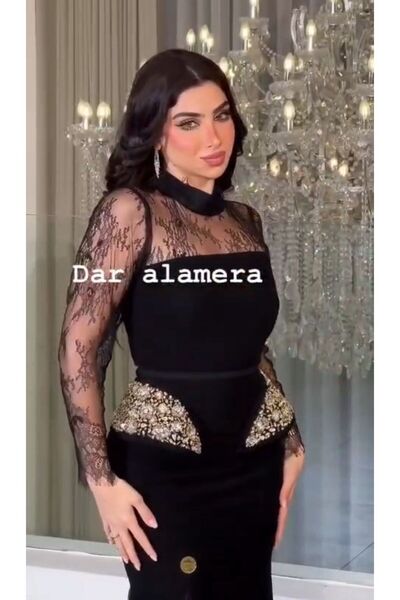 NALA FASHION A luxurious black evening dress with an elegant design that comb...