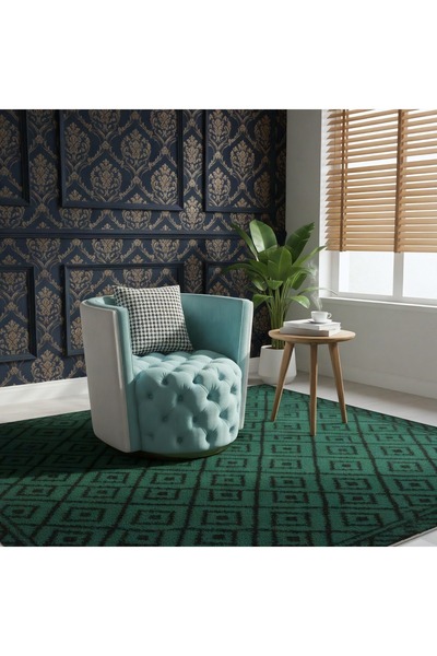 GLAMOURE HOME A comfortable chair upholstered in blue and off-white fabric, s...