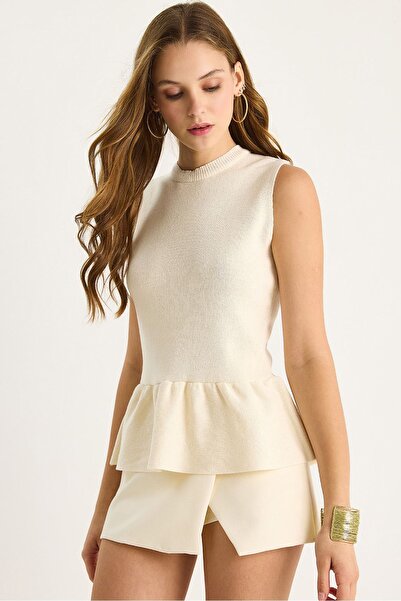 Hiccup Bianco Lucci round neck knitted blouse with peplum