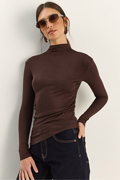 Hiccup LUCCI blouse with high collar, long sleeves and Ruffled details