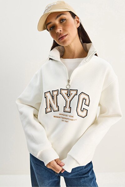 Hiccup LUCCI Oversized knitted sweatshirt with zip collar and embroidery