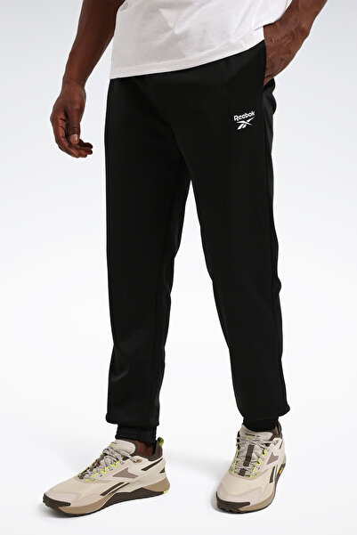 Reebok بنطال رياضي أسود للجنسين من RI VECTOR KNIT TRAC