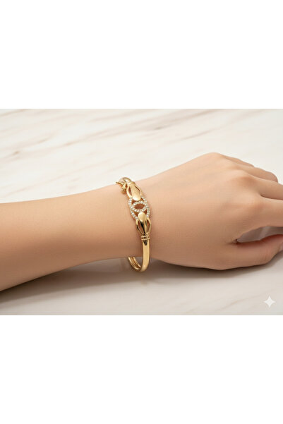 burjalmodah Modern Elegance Gold Bracelet - A sophisticated wristband adorned...