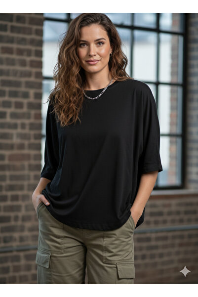 Serena Women's oversized black T-shirt with butterfly sleeves