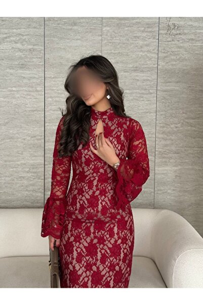 Special-DIARA A luxurious dark purple evening dress featuring a plunging neck...