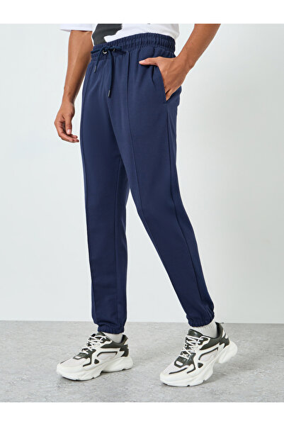 Styli Men Navy Blue Solid Joggers with Pintuck Detail