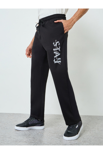 Styli Men Black Graphic Print Relaxed Joggers