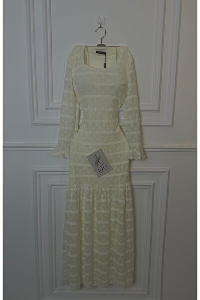 Joji A soft, layered dress with sequins and long sleeves