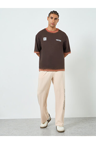 Styli Men Brown Graphic Print Oversized T-Shirt