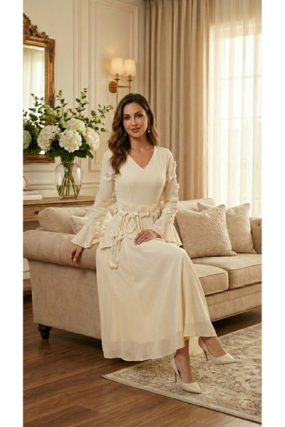 BROOKLYN STYLE A Barbie midi dress adorned with raised roses and artistic rop...