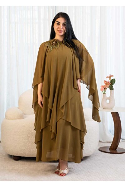 DVNA A chiffon cape dress with regal layers and a charming olive color.